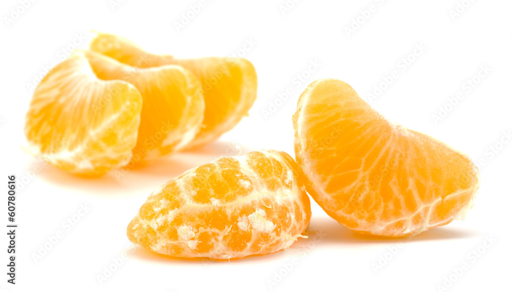 Peeled tangerine segments isolated on white background Peeled tangerine segments isolated on white background