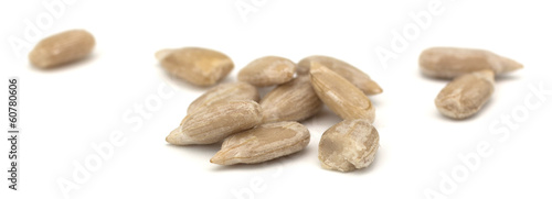 Fotografie Sunflower seeds isolated on white background