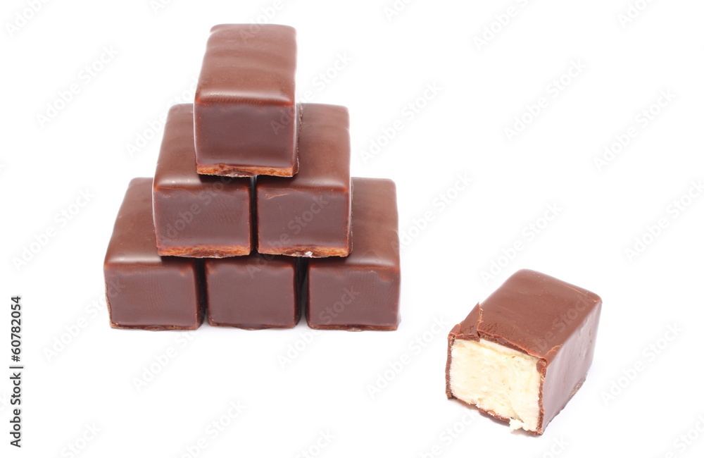 Stack of chocolate sweets on white background Stack of chocolate sweets on white background