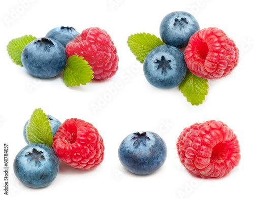 Raspberry and blueberry isolated on white background