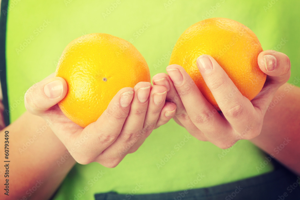 Beautiful young woman with orange. Beautiful young woman with orange.