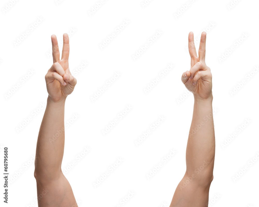 man hands showing v-sign man hands showing v-sign