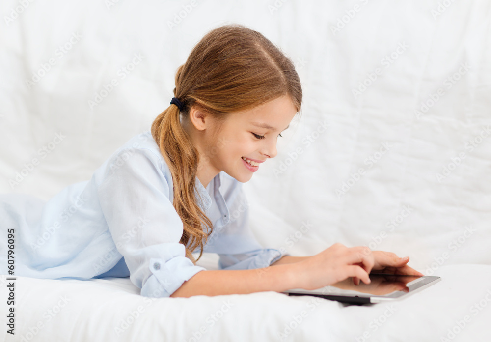 smiling girl with tablet computer at home smiling girl with tablet computer at home