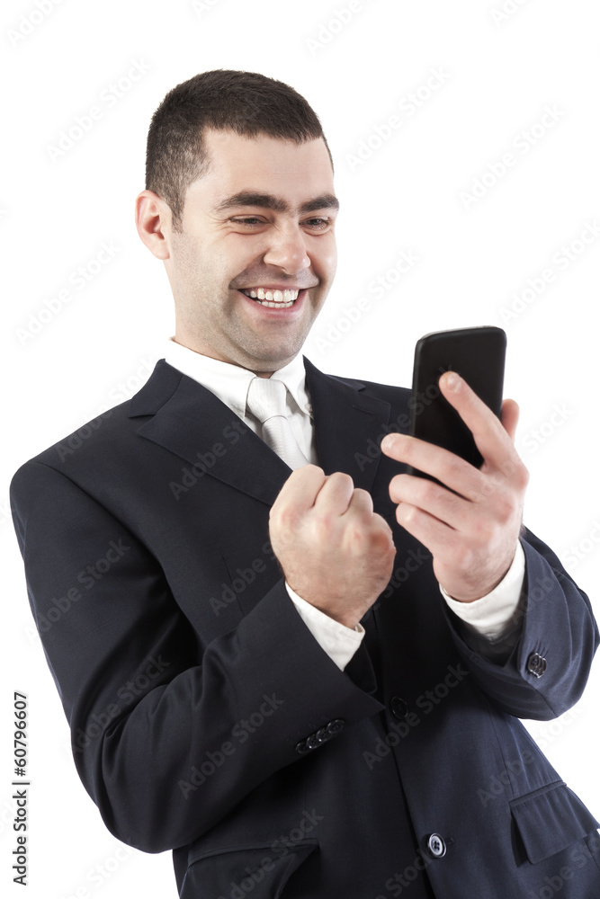 Handsome business man on the videophone screaming happy Handsome business man on the videophone screaming happy