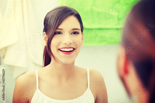 Young brunette at bathroom