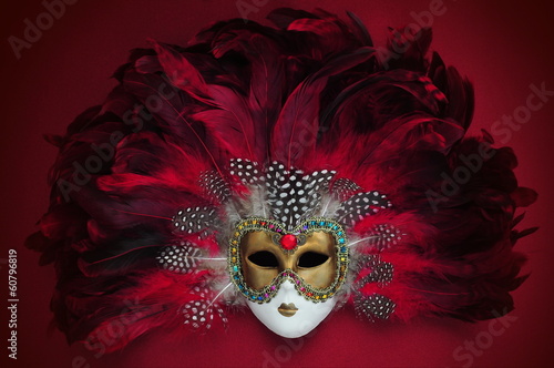 Red and golden mask with feathers (Venice)