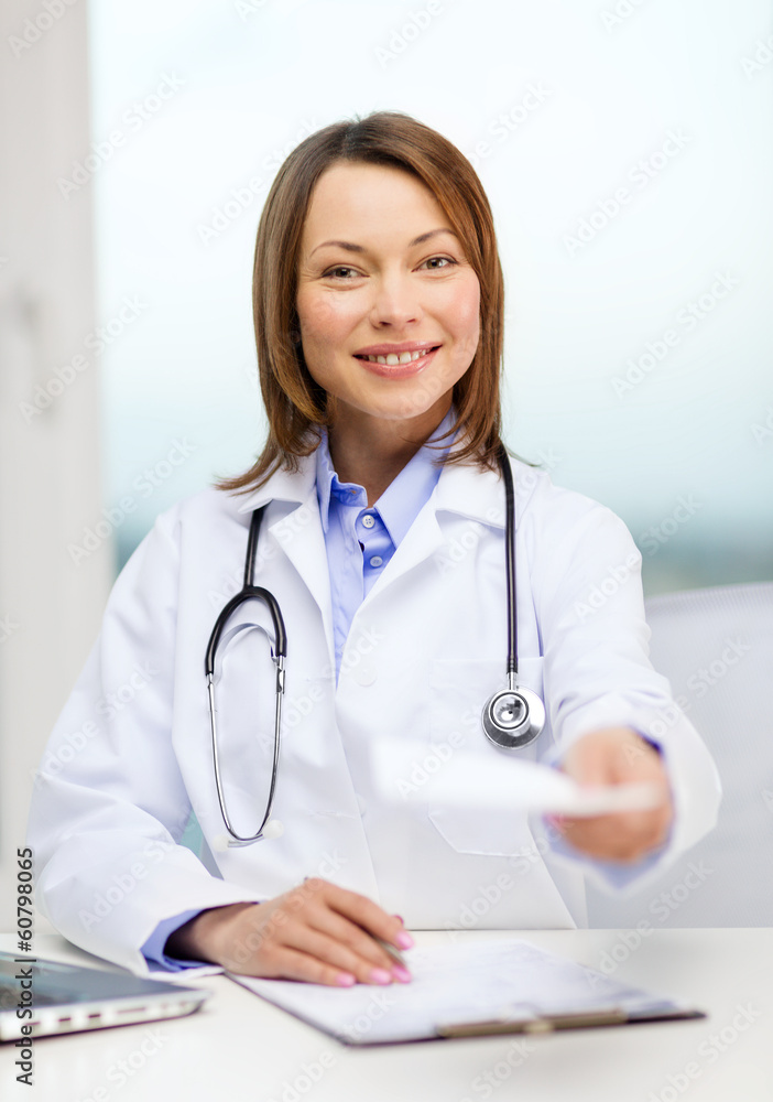smiling doctor with laptop computer and clipboard smiling doctor with laptop computer and clipboard