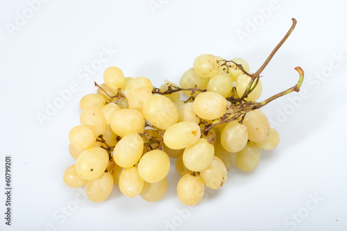 Sweet and ripe white grapes isolated on white