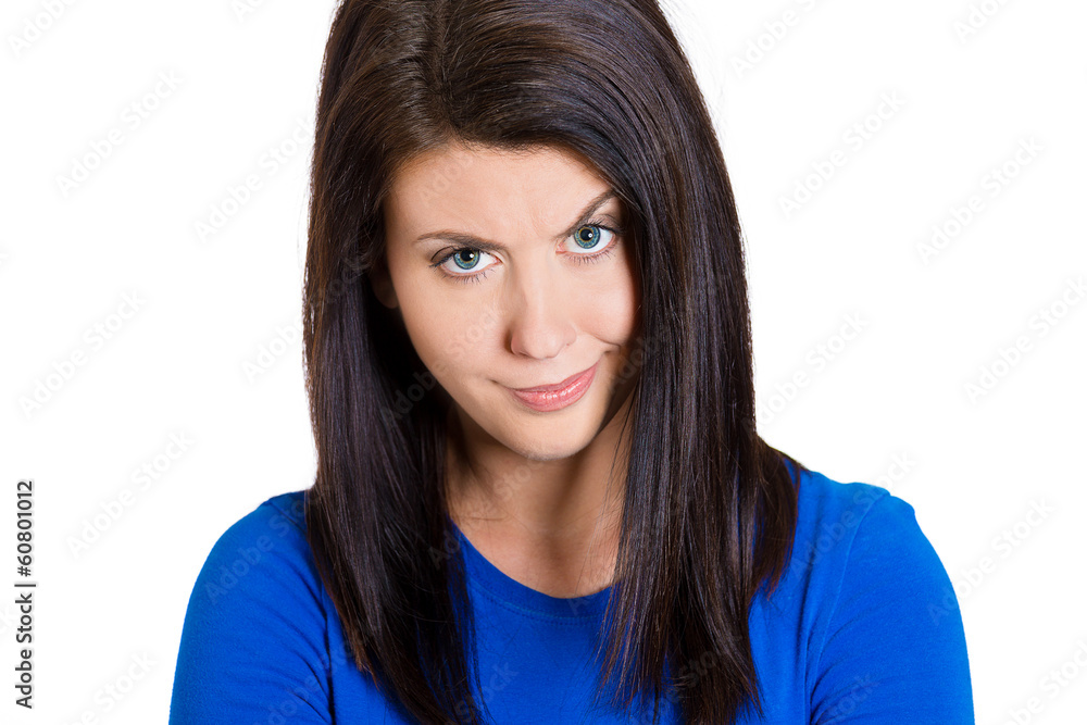 Skeptical woman with displeasure, disapproval on her face Skeptical woman with displeasure, disapproval on her face