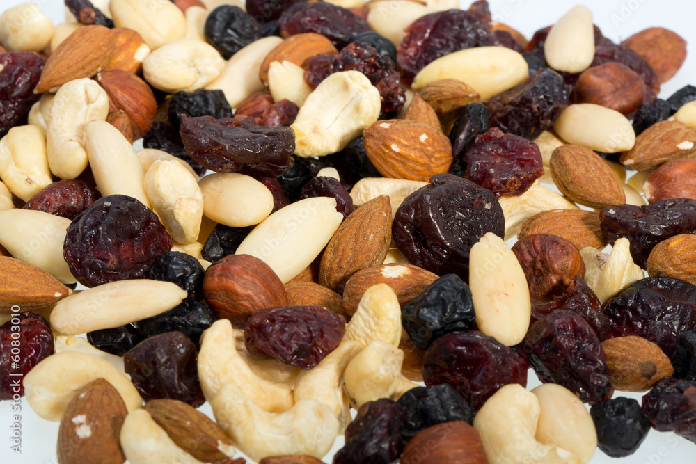 mixed nuts and dried fruits isolated on white background mixed nuts and dried fruits isolated on white background