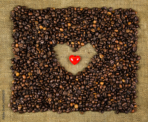 Little heart on coffee beans