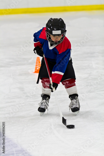 Boy at ice hockey practice