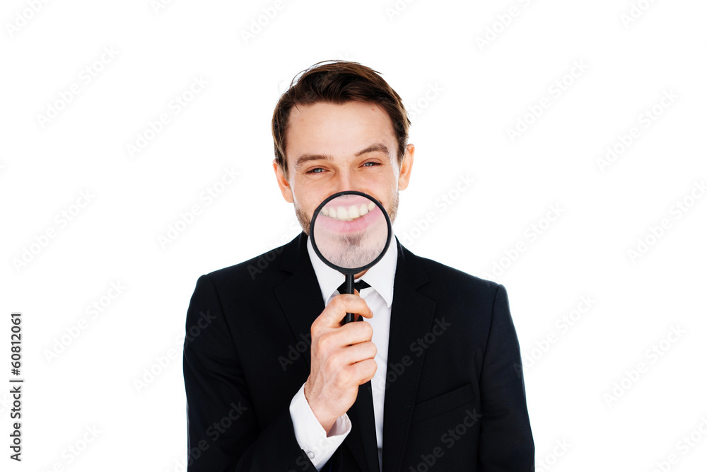 Businessman with a magnified smile Businessman with a magnified smile