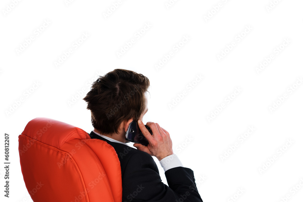 Businessman talking on a mobile phone Businessman talking on a mobile phone
