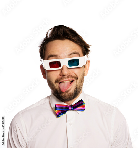 Serious young man wearing 3d glasses