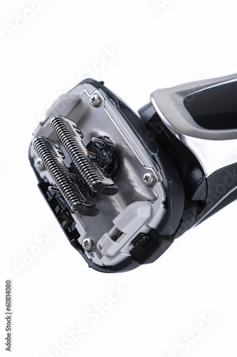 Closeup Image of the Blades of Fashionable Electric Shaver On Wh