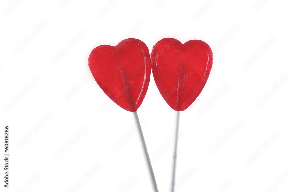 couple of red heart shape lollipops in love concept