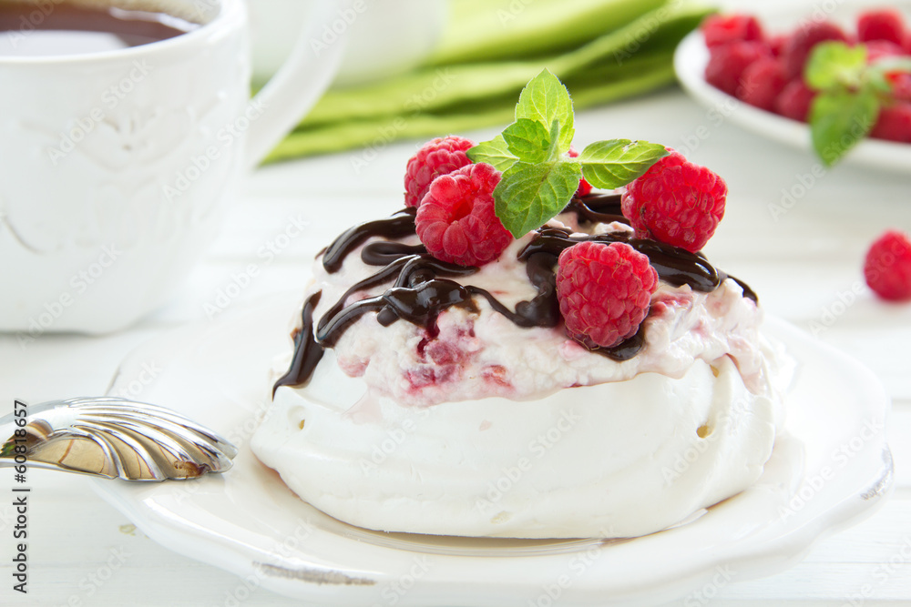 Meringue with raspberry cream, raspberry and chocolate. Meringue with raspberry cream, raspberry and chocolate.