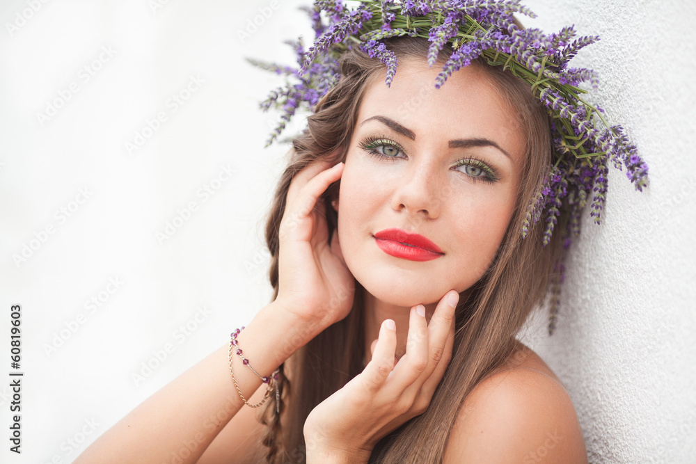 Portrait of young woman in lavender wreath. Fashion, Beauty.