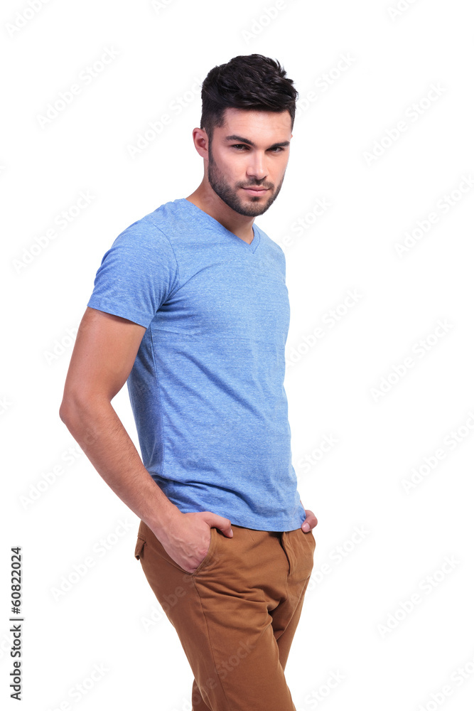 smiling casual man with hands in pockets smiling casual man with hands in pockets