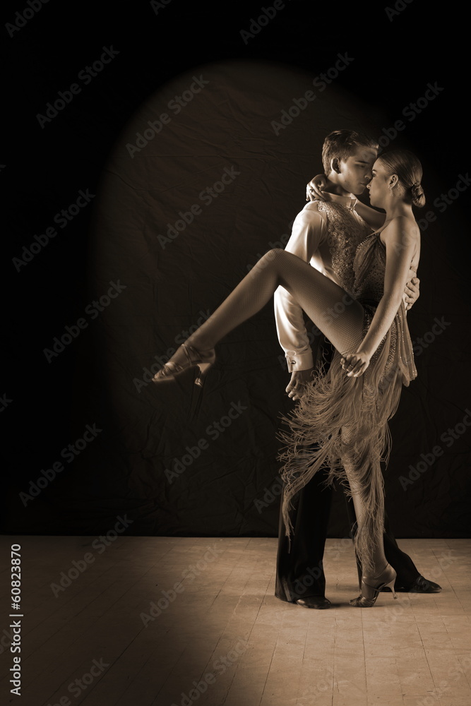 dancers in ballroom against black background dancers in ballroom against black background