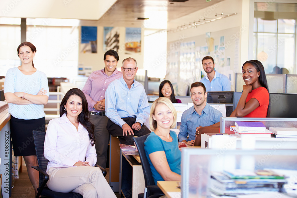 Portrait Of Businesspeople In Modern Open Plan Office Portrait Of Businesspeople In Modern Open Plan Office