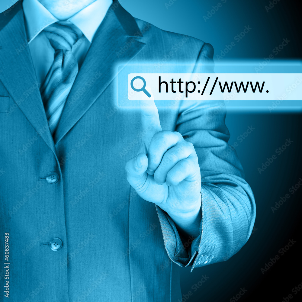 Businessman pushing virtual search bar Businessman pushing virtual search bar