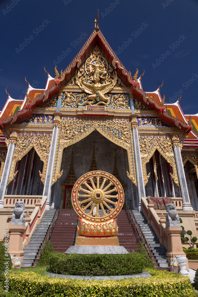 thai style royal temple on blue isolated