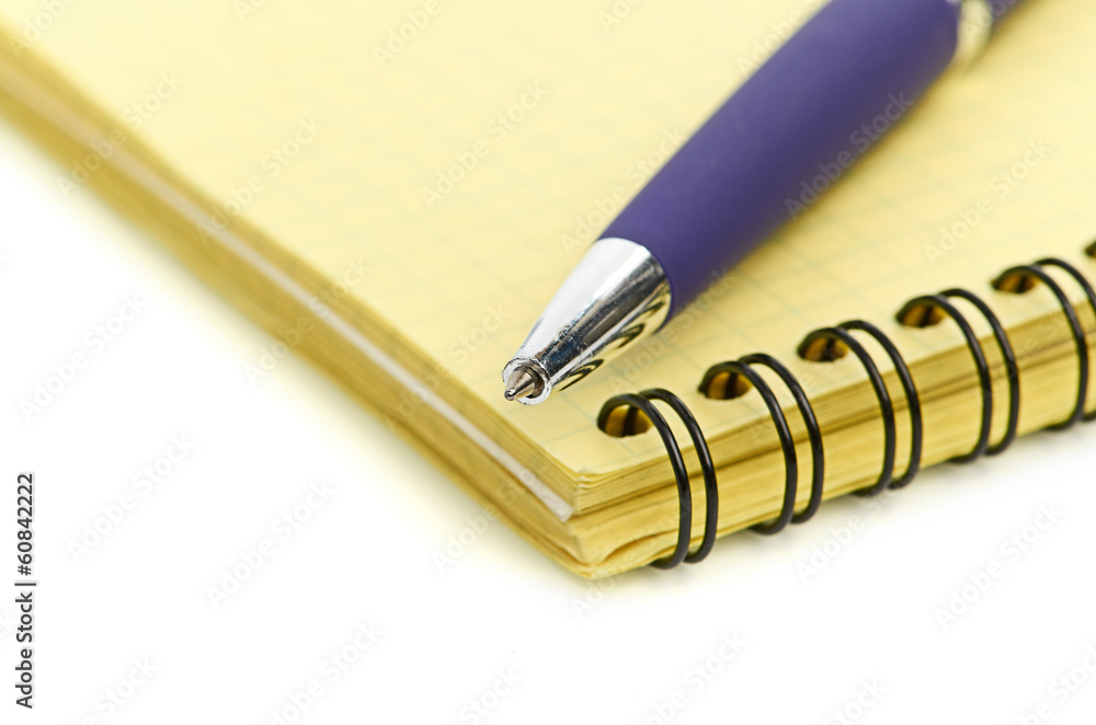 notepad and pen isolated on white background notepad and pen isolated on white background