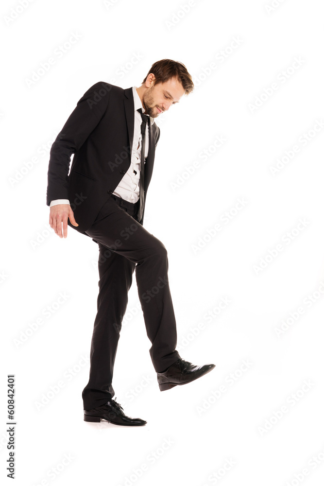 Businessman making a stamping gesture Businessman making a stamping gesture