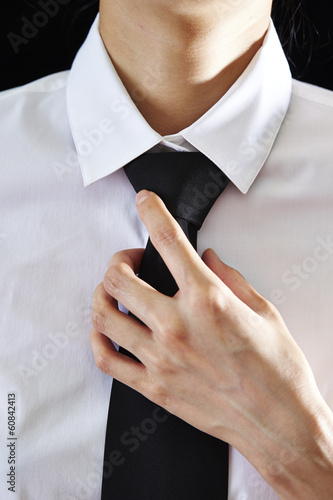 'black tie, white shirt'