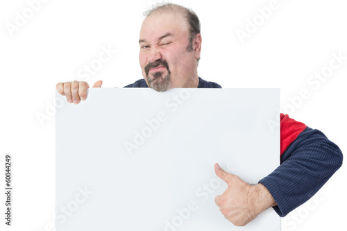 Man holding a blank billboard and giving thumbs-up