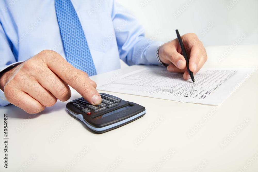 The businessman and calculator The businessman and calculator