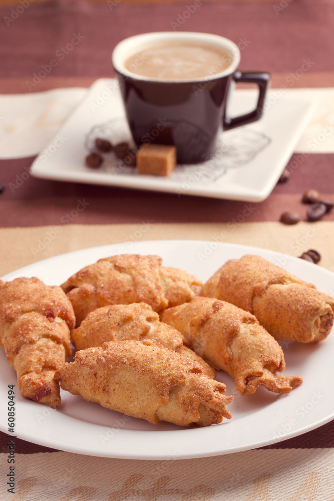 Coffee served with croissant Coffee served with croissant