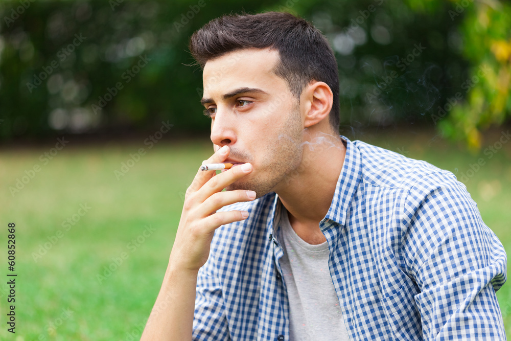 Man smoking a cigarette Man smoking a cigarette