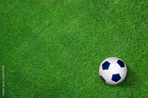 Football lying on perfect Lawn - Soccer Background © Petair