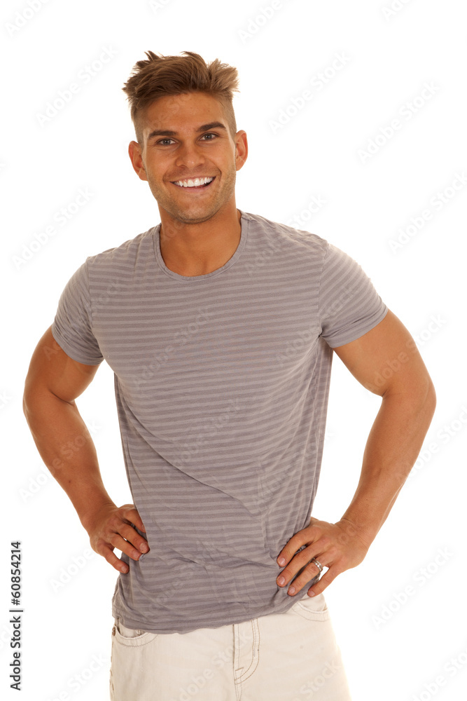 man in gray striped shirt hands hips smiling man in gray striped shirt hands hips smiling
