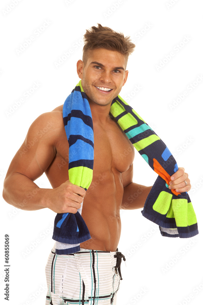 man swimsuit with towel around neck man swimsuit with towel around neck