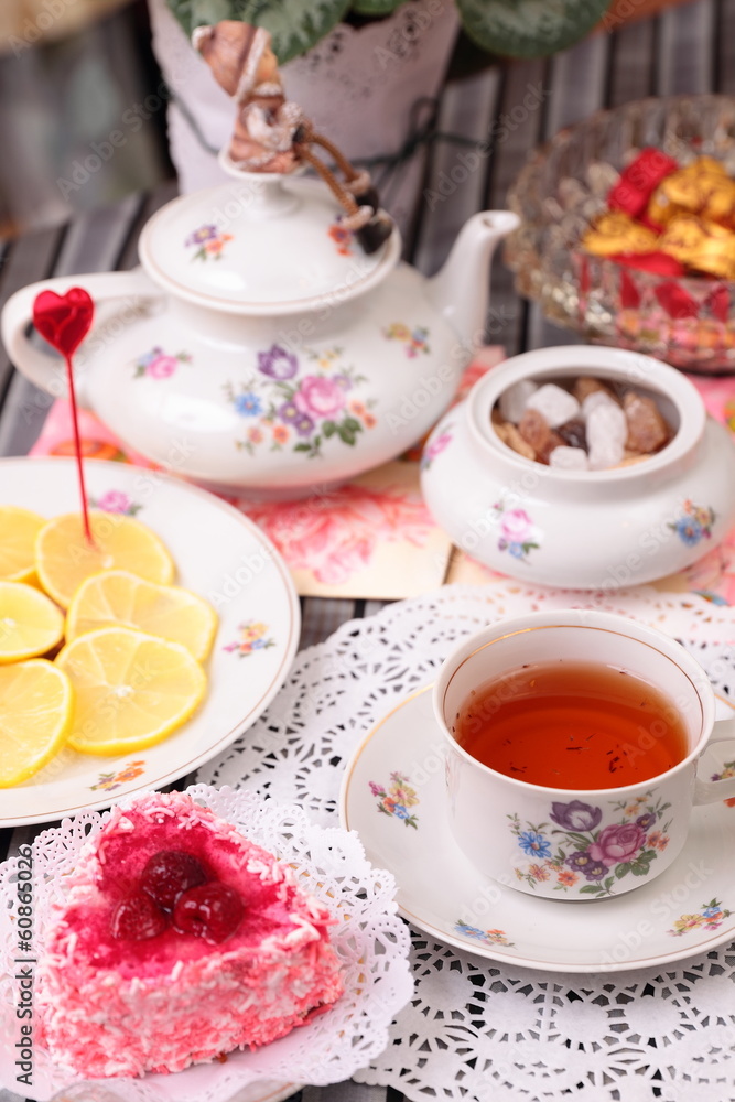Warm cup of tea and sweets Warm cup of tea and sweets