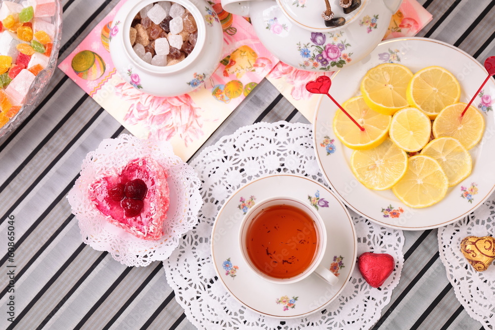 Warm cup of tea and sweets Warm cup of tea and sweets