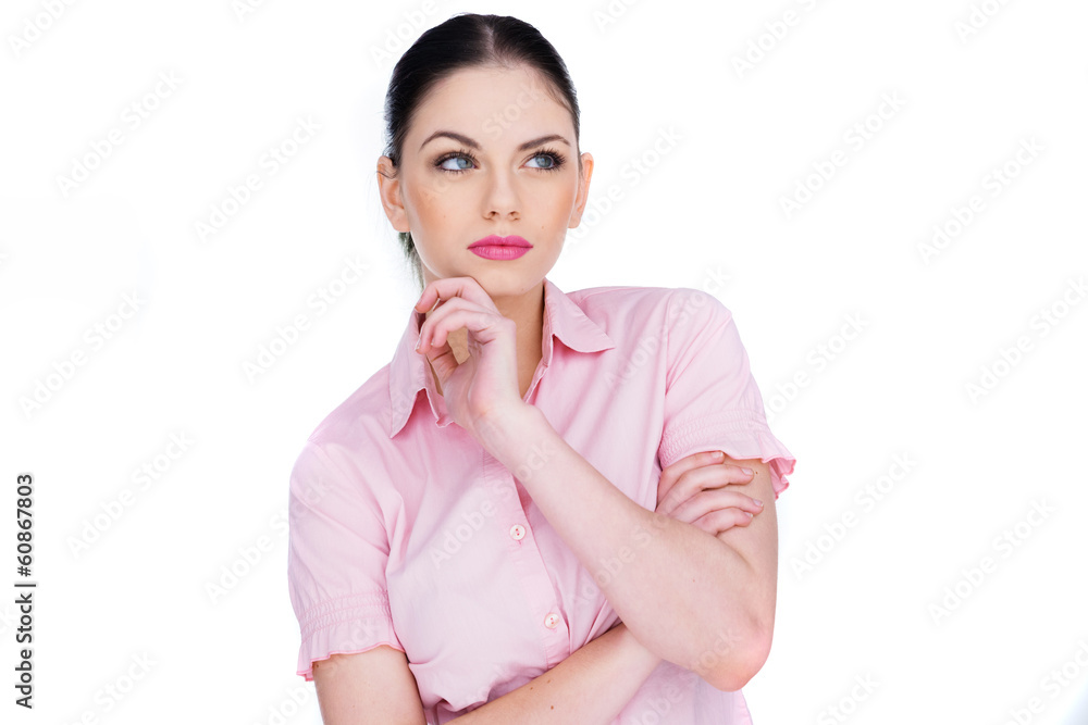 Attractive young woman deep in thought Attractive young woman deep in thought