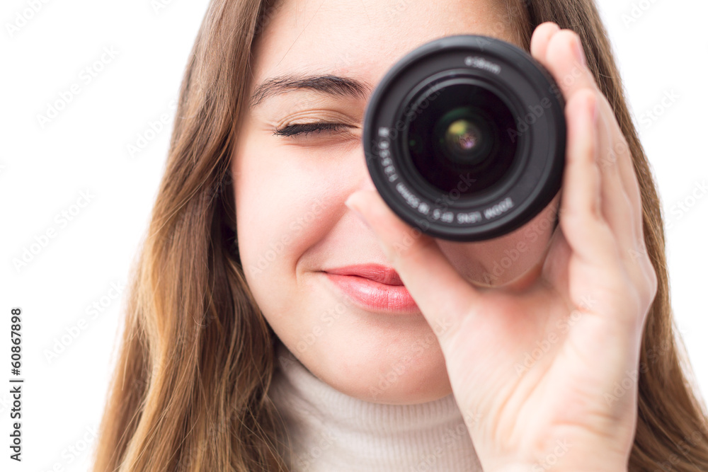 portrait of beautiful girl with the lens near the eye portrait of beautiful girl with the lens near the eye