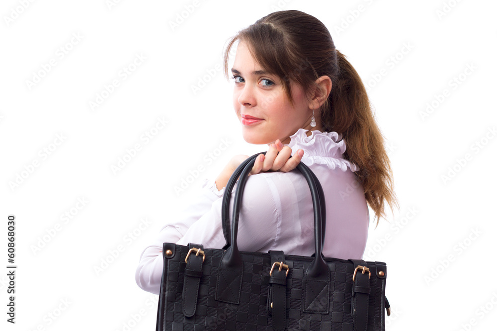 Beautiful cute young girl with a bag behind the back Beautiful cute young girl with a bag behind the back