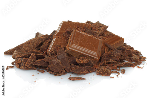 Broken chocolate bar isolated on white background .