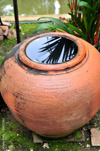 Rainwater storage jars in spa photo