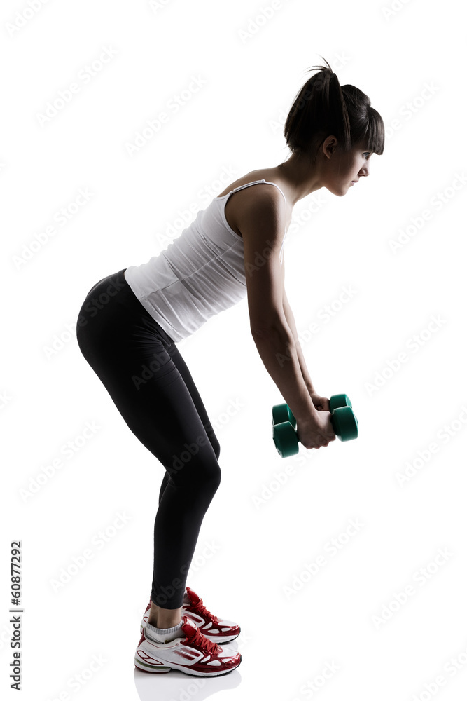 sport girl doing with exercise dumbbells, fitness woman studio s