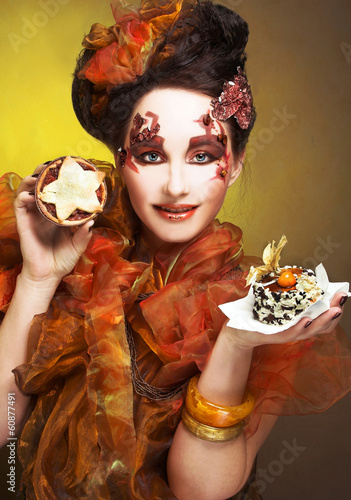 Young woman with cake photo