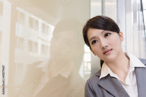 Asian business woman thinking and feel sorrow