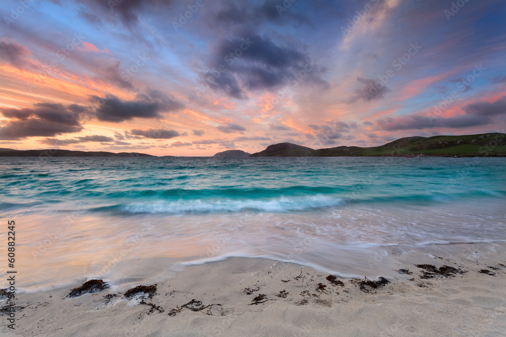 Stunning sunrise over Vatersay beach, Outer Hebrides .