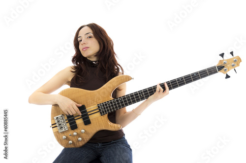 Young woman playing a bass guitar